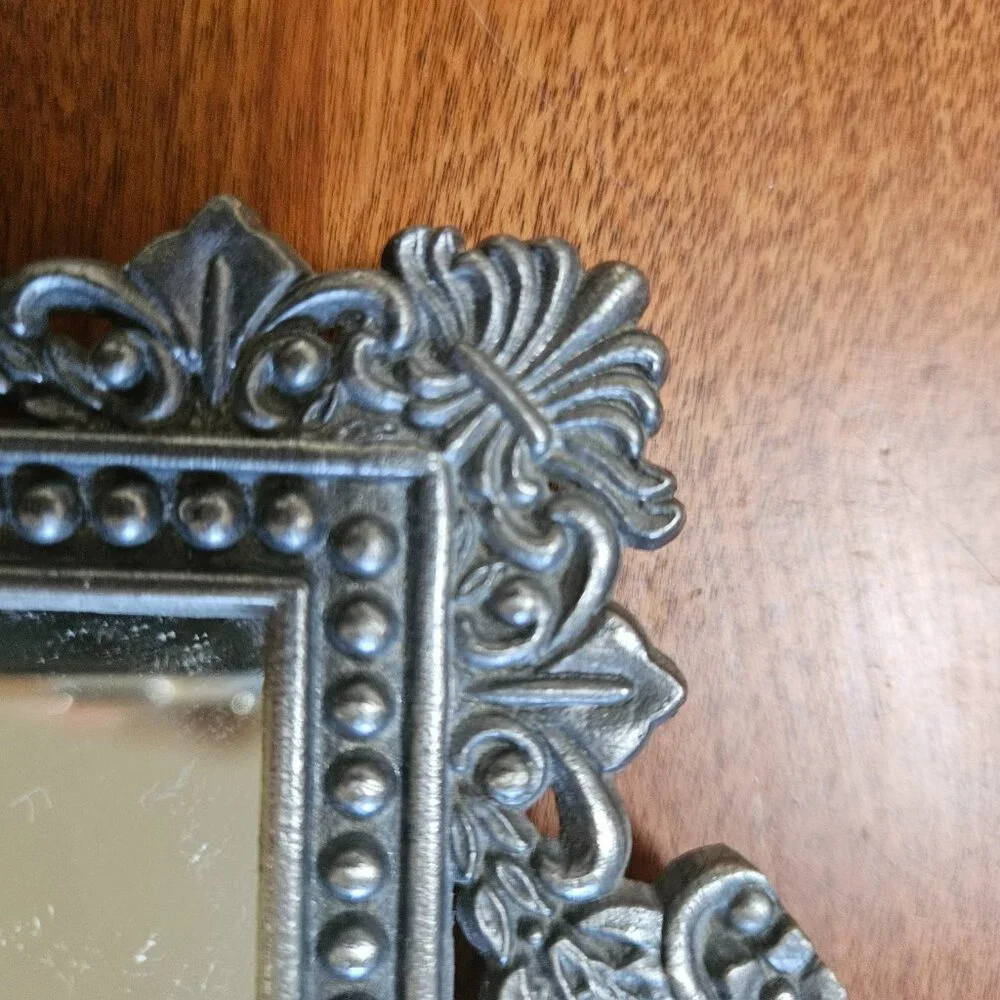 beautiful vintage ornate mirror has hook for hanging